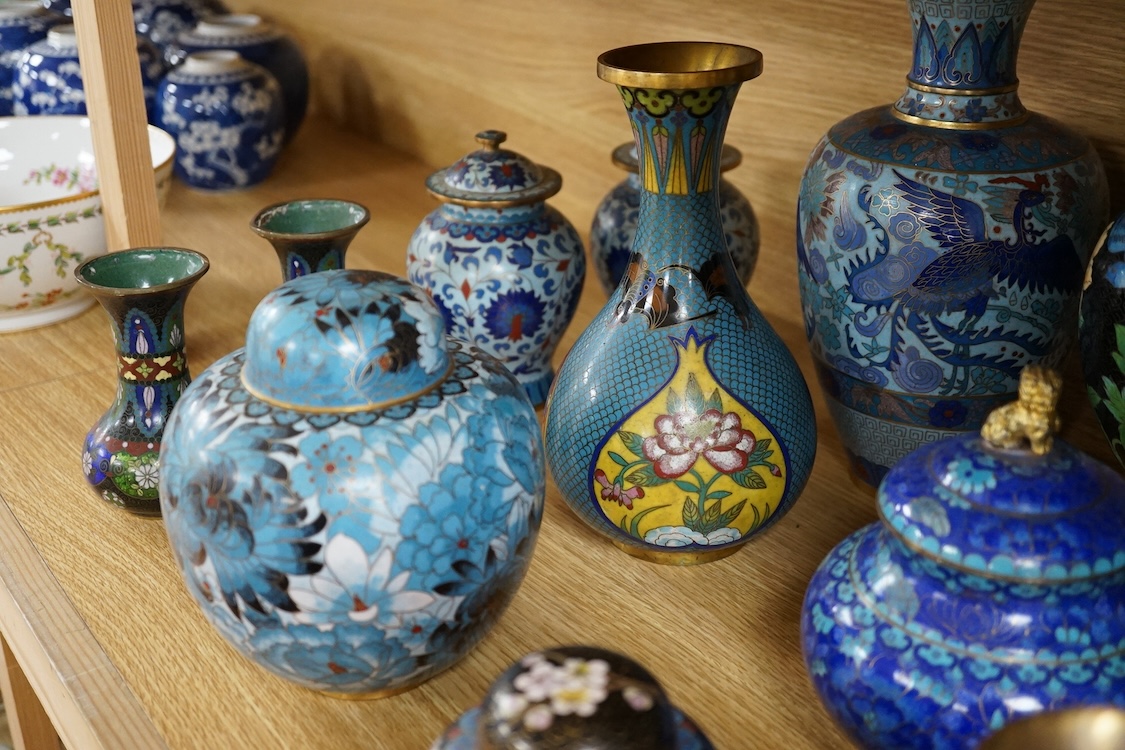 Thirteen various sized Chinese cloisonné enamel jars with covers and similar vases, tallest vase 31cm high.